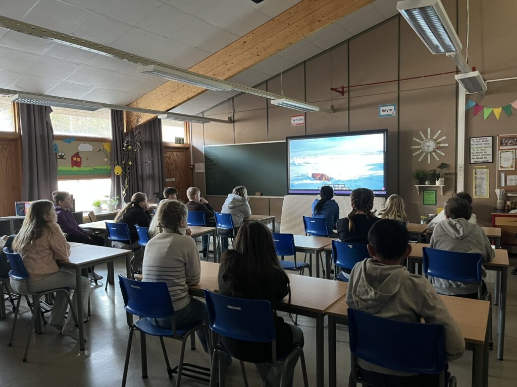 Learners in a Norwegian classroom, watching a recording from the Sámi people. Photo: Marte Maurabakken/Climate Creativity.
