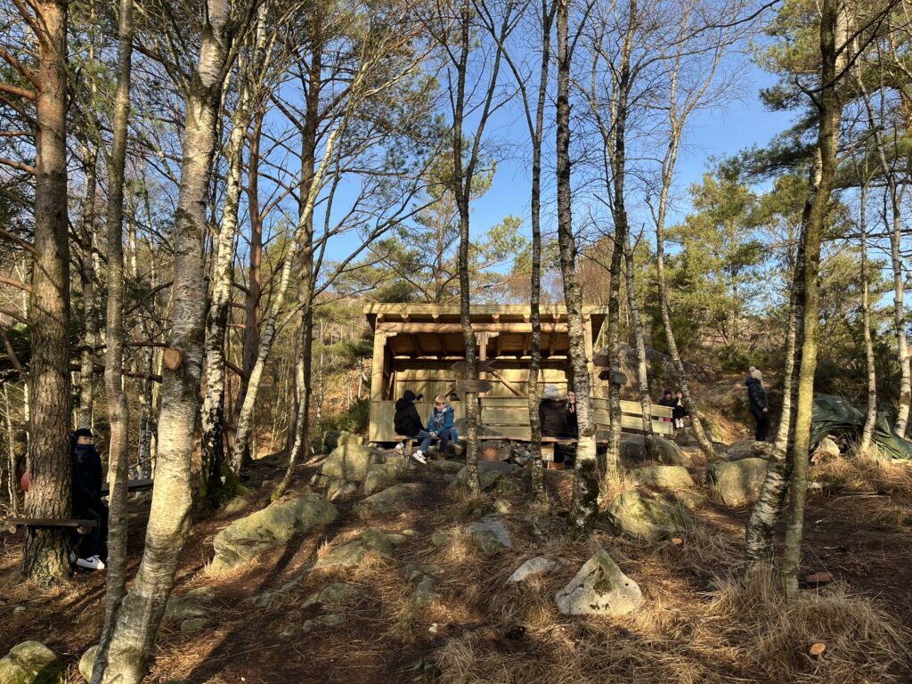 Learners in pairs and trios during active listening in a nature area. Photo: Marte Maurabakken/Climate Creativity.